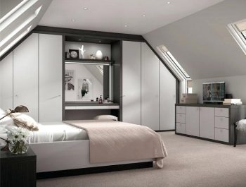 Fitted bedroom wardrobes with mirrored doors