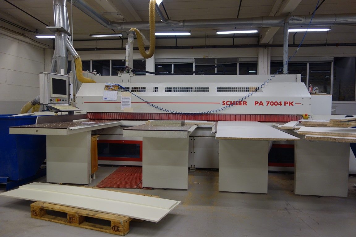 A Scheer beam saw cutting panels on the EGI factory floor in Greenford